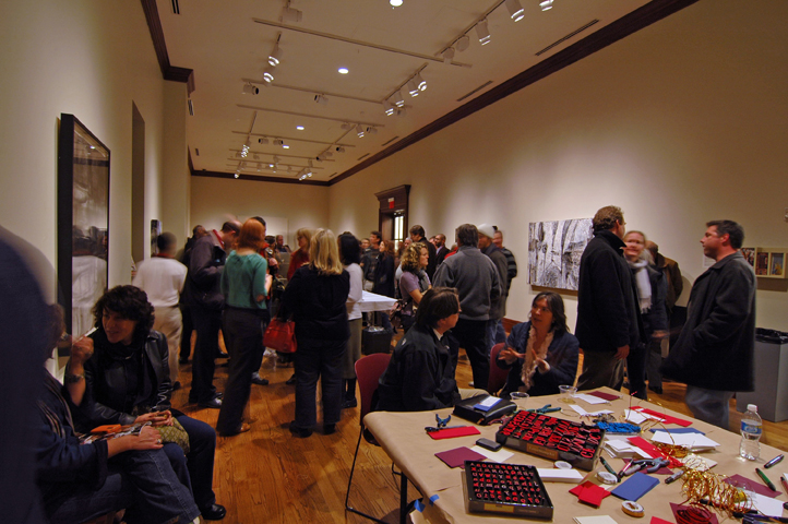 In December, HELVETICA attendees gather in the Library's gallery space during the pre-screening reception. (Photo By John Cate)