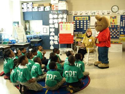 NPT President and CEO Beth Curley and PBS favorite Arthur Read to Caldwell Elementary School Children